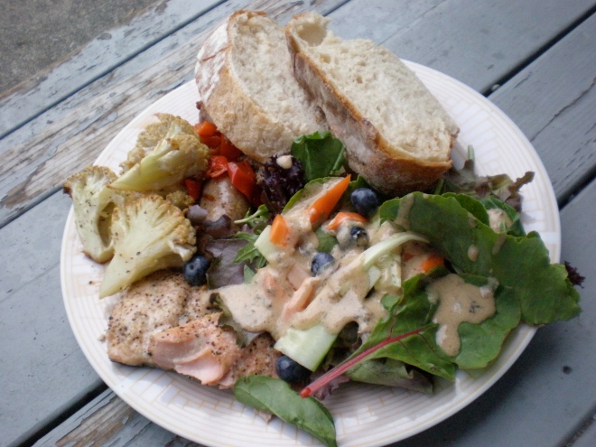 Summer farmers market meal: Tall Grass bread, Oxbow cauliflower, Seabreeze sausage, Mama Lil's peppers, Loki pink salmon, Willie Green's salad mix, Whistling Train carrots and Rent's Due Ranch blueberries.